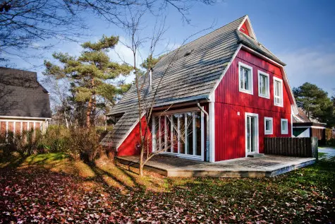 Red residential house with terrace in Zingst that has been officially surveyed